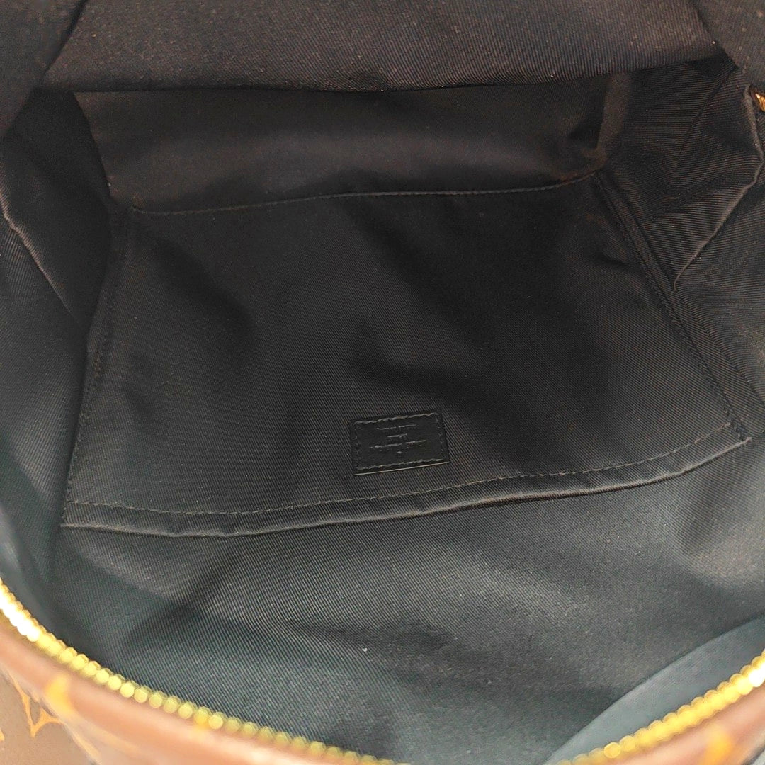 Monogram Coated Canvas Backpack Brown
