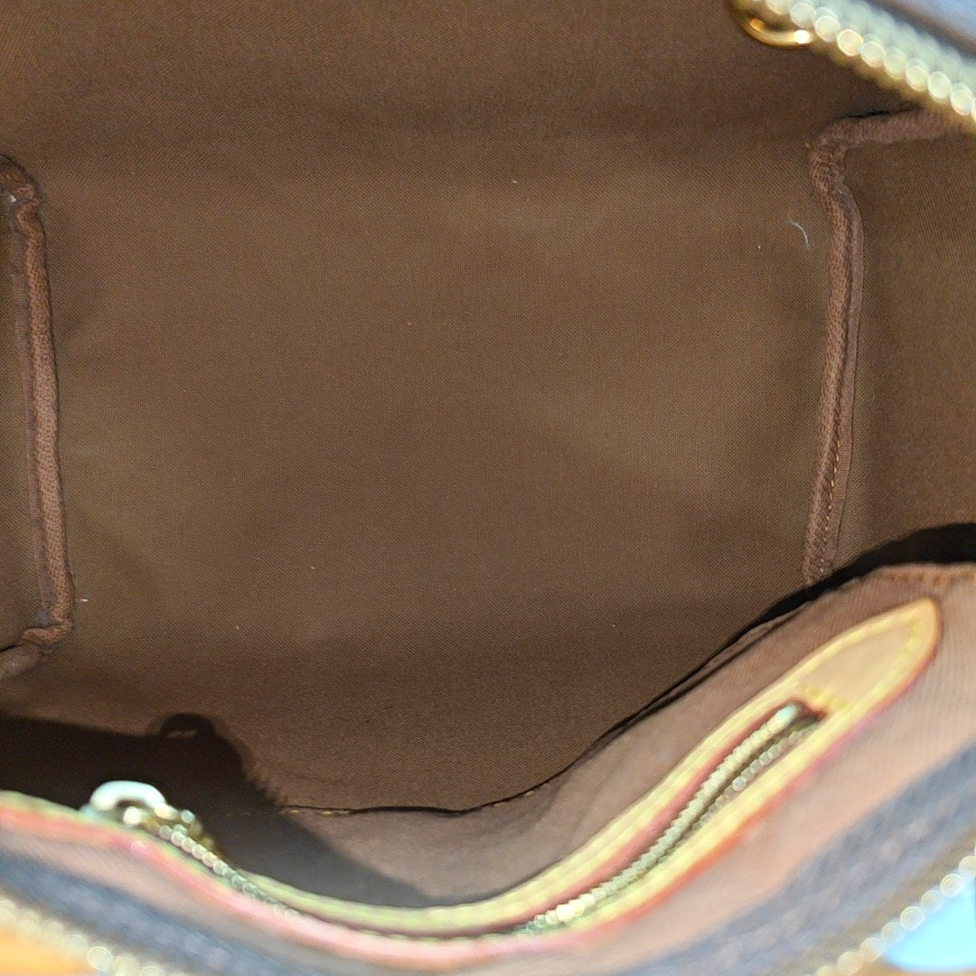 SPEEDY 25 Monogram Coated Canvas Brown