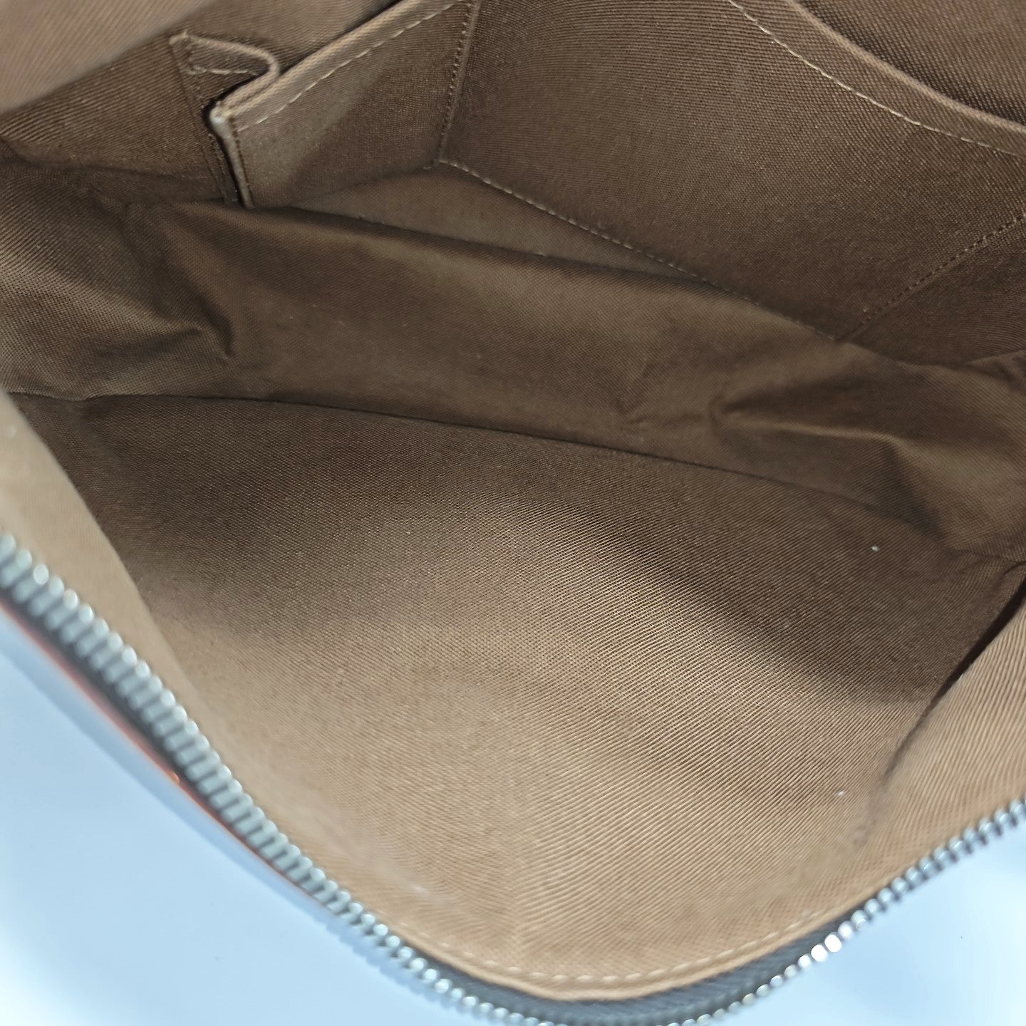TULUM PM Monogram Coated Canvas Brown
