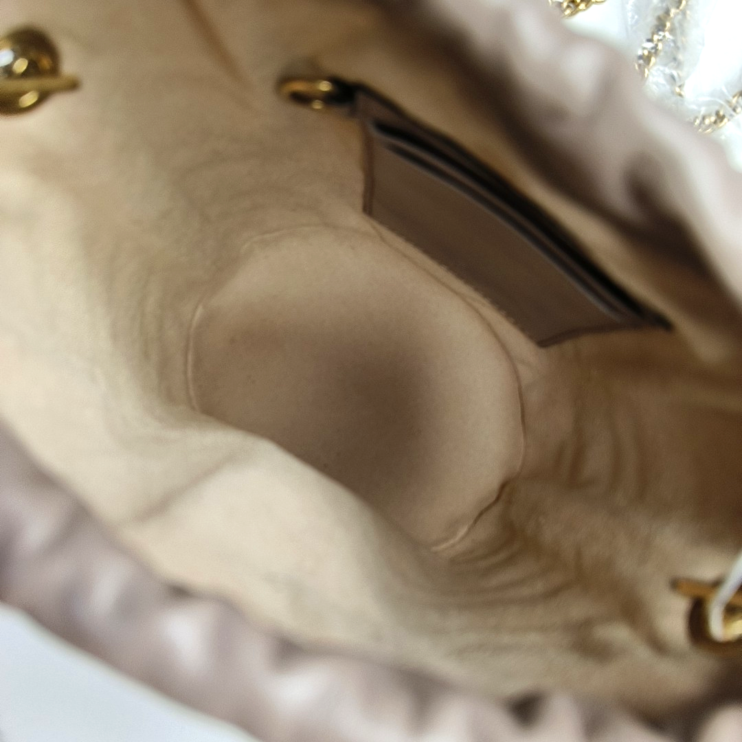 Authenticated pre-owned  GG Marmont Mini Quilted Calfskin Beige - Bucket Bag at Looply