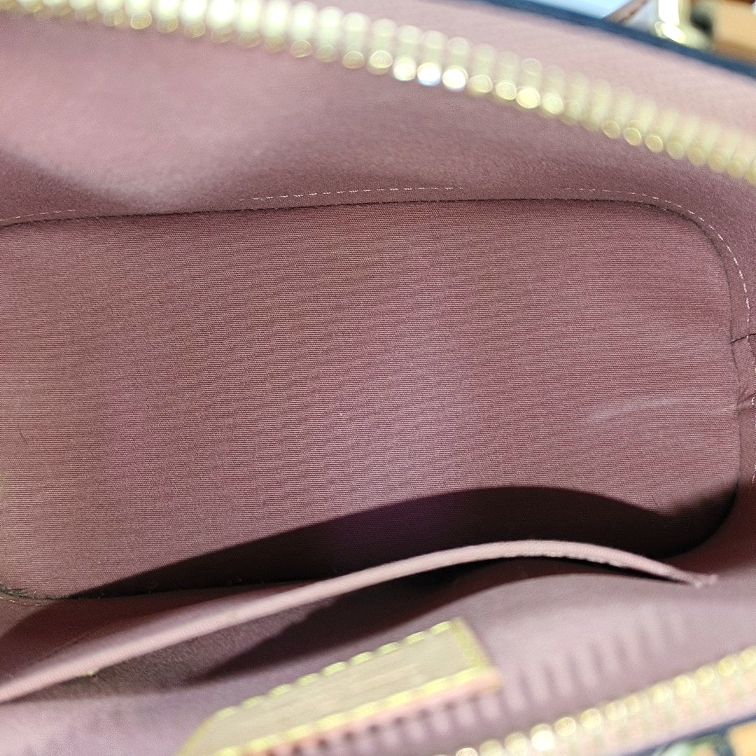 Authenticated pre-owned  ALMA Monogram Patent Leather Yellow - Shoulder Bag at Looply