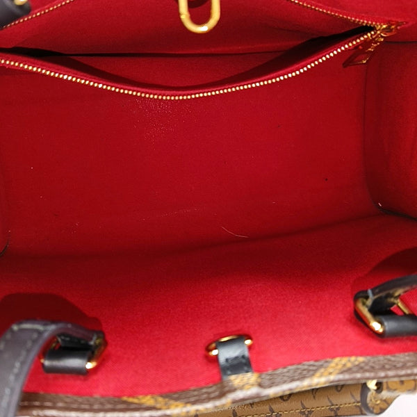 ONTHEGO MM Monogram Coated Canvas Brown