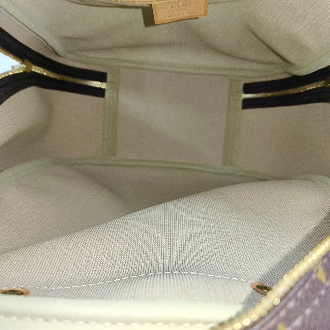EXCURSION Monogram Coated Canvas Brown