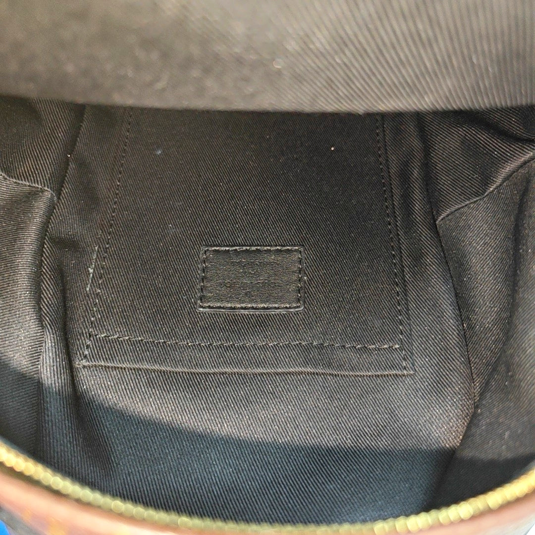 Authenticated pre-owned  PALM SPRINGS Mini Monogram Coated Canvas Brown - Backpack at Looply