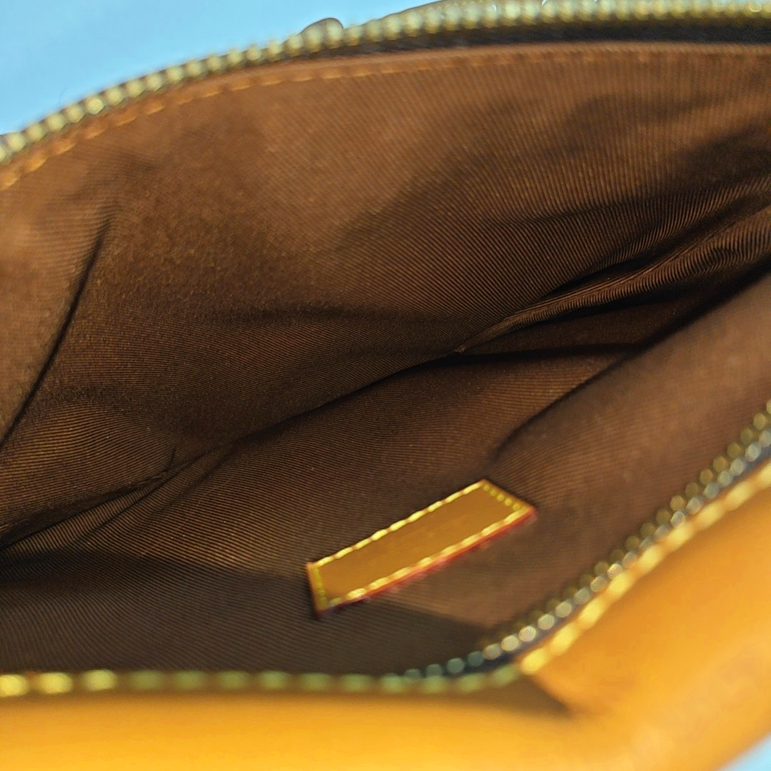 SAUMUR PM Monogram Coated Canvas Brown
