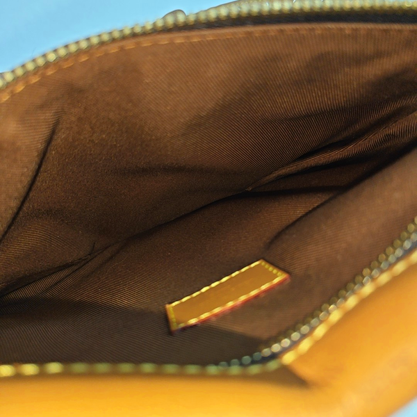 SAUMUR PM Monogram Coated Canvas Brown
