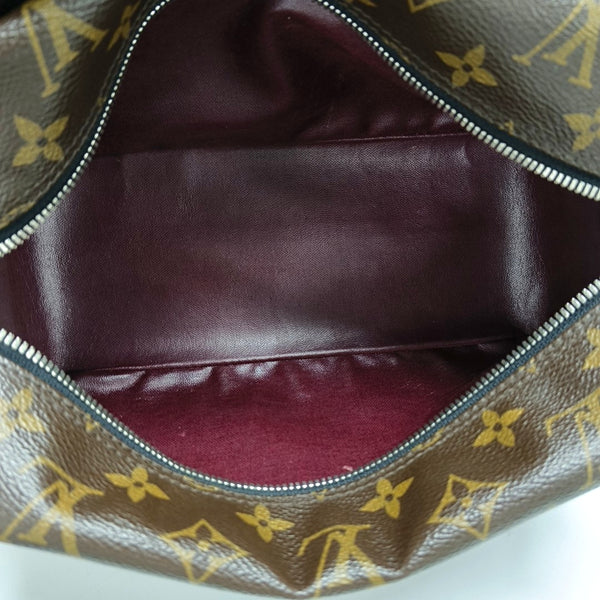 Monogram Coated Canvas Clutch Brown