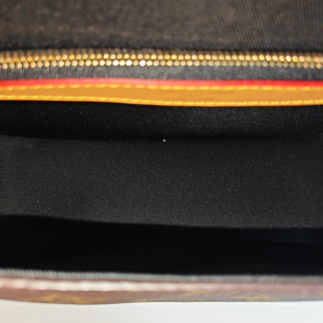 DIANE Monogram Coated Canvas Brown