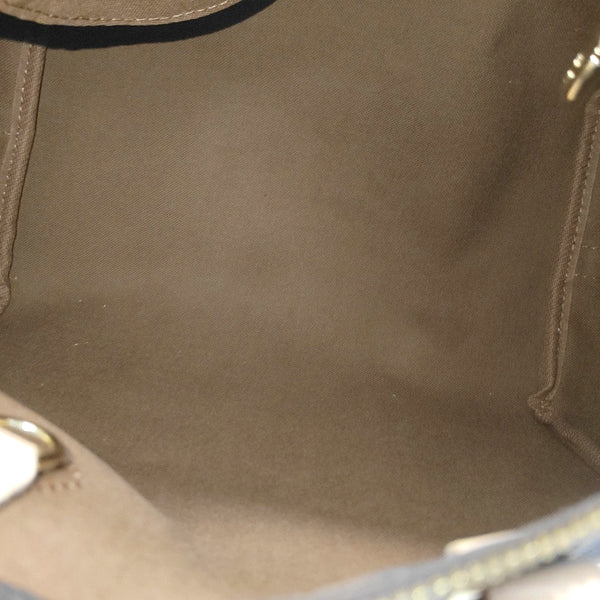 SPEEDY 25 Monogram Coated Canvas Brown