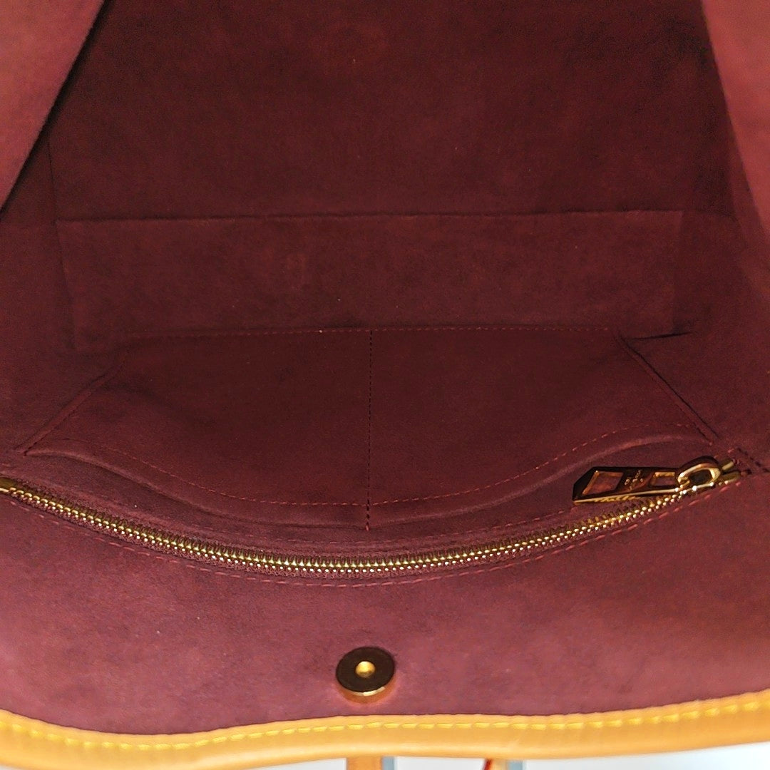 CARRYALL PM Monogram Coated Canvas Brown