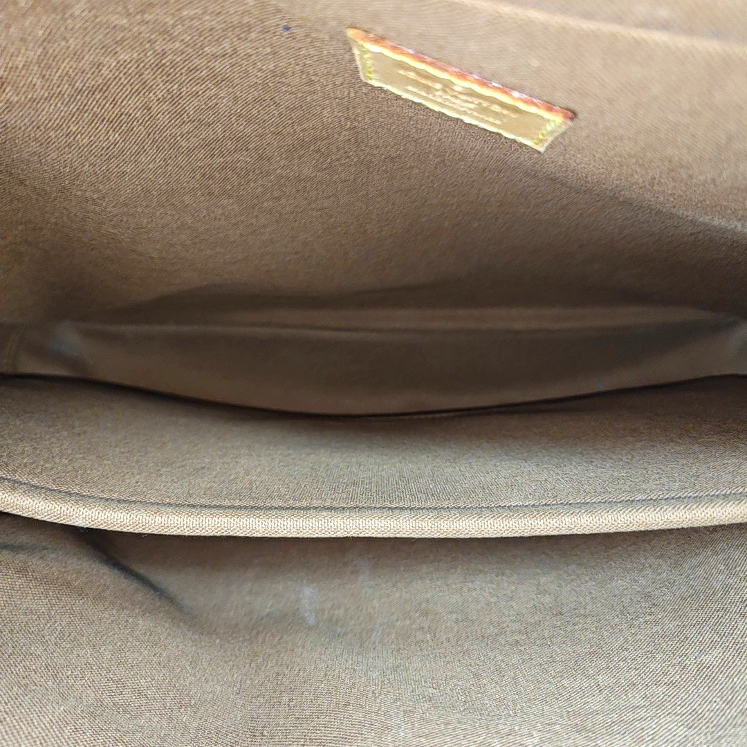 ICARE Monogram Coated Canvas Brown