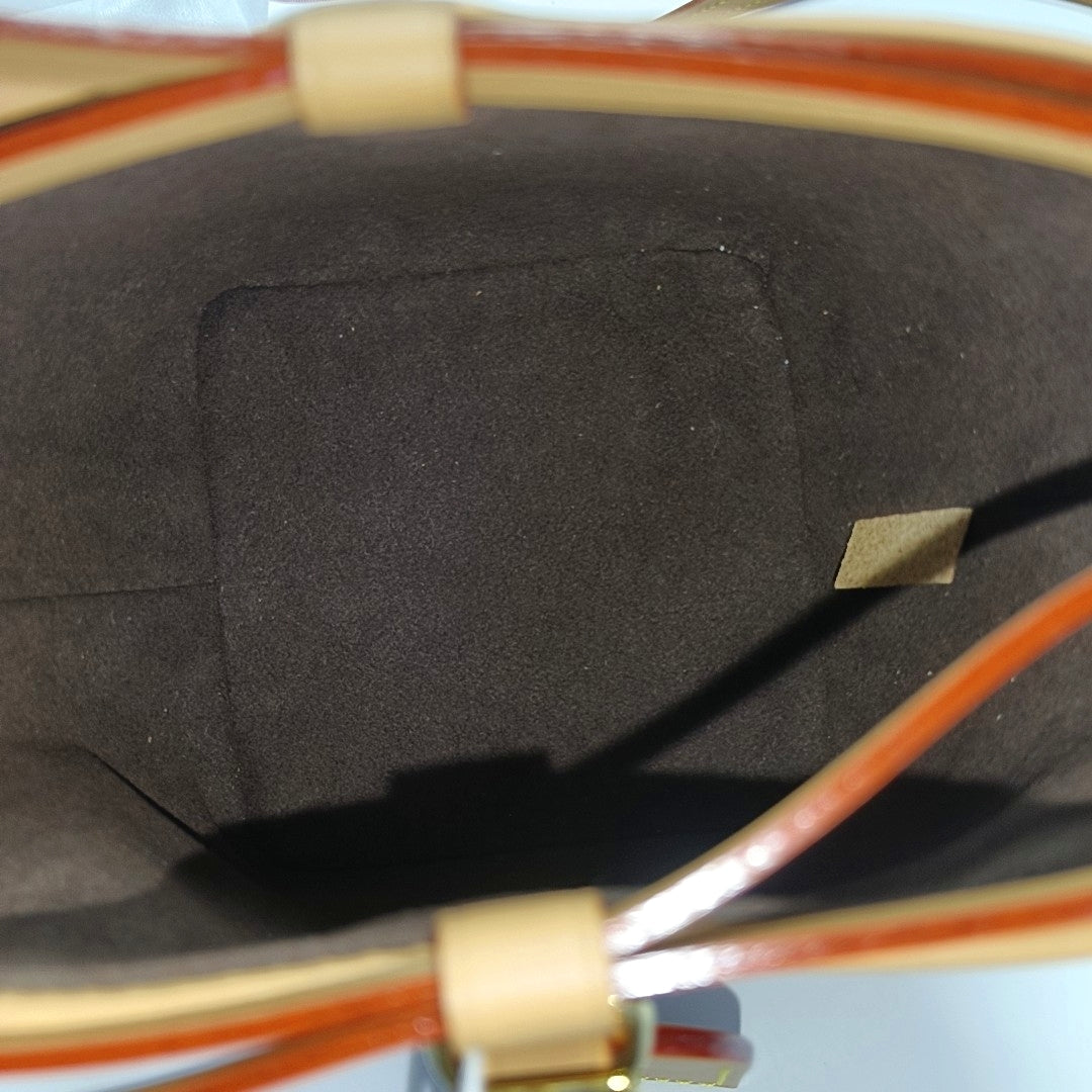 NOÉ Monogram Coated Canvas Brown