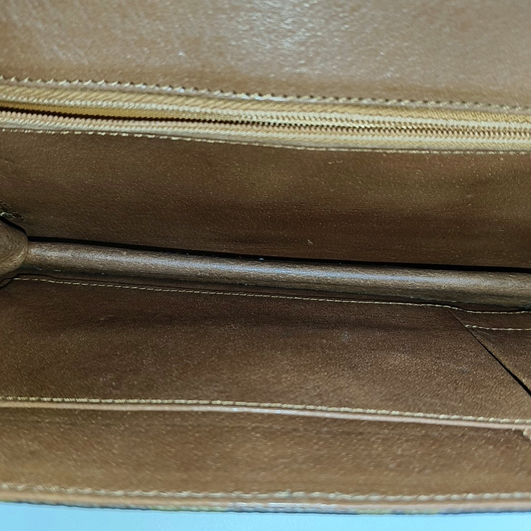 DAME Monogram Coated Canvas Brown