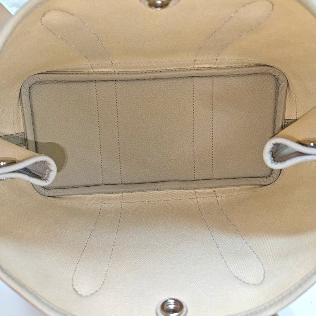 Authenticated pre-owned  Garden Party Canvas White - Top Handle Bag at Looply