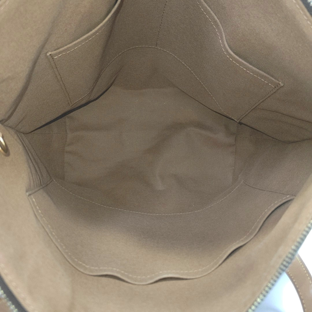 TOTALLY Monogram Coated Canvas Brown