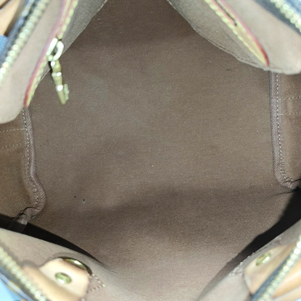 SPEEDY 25 Monogram Coated Canvas Brown