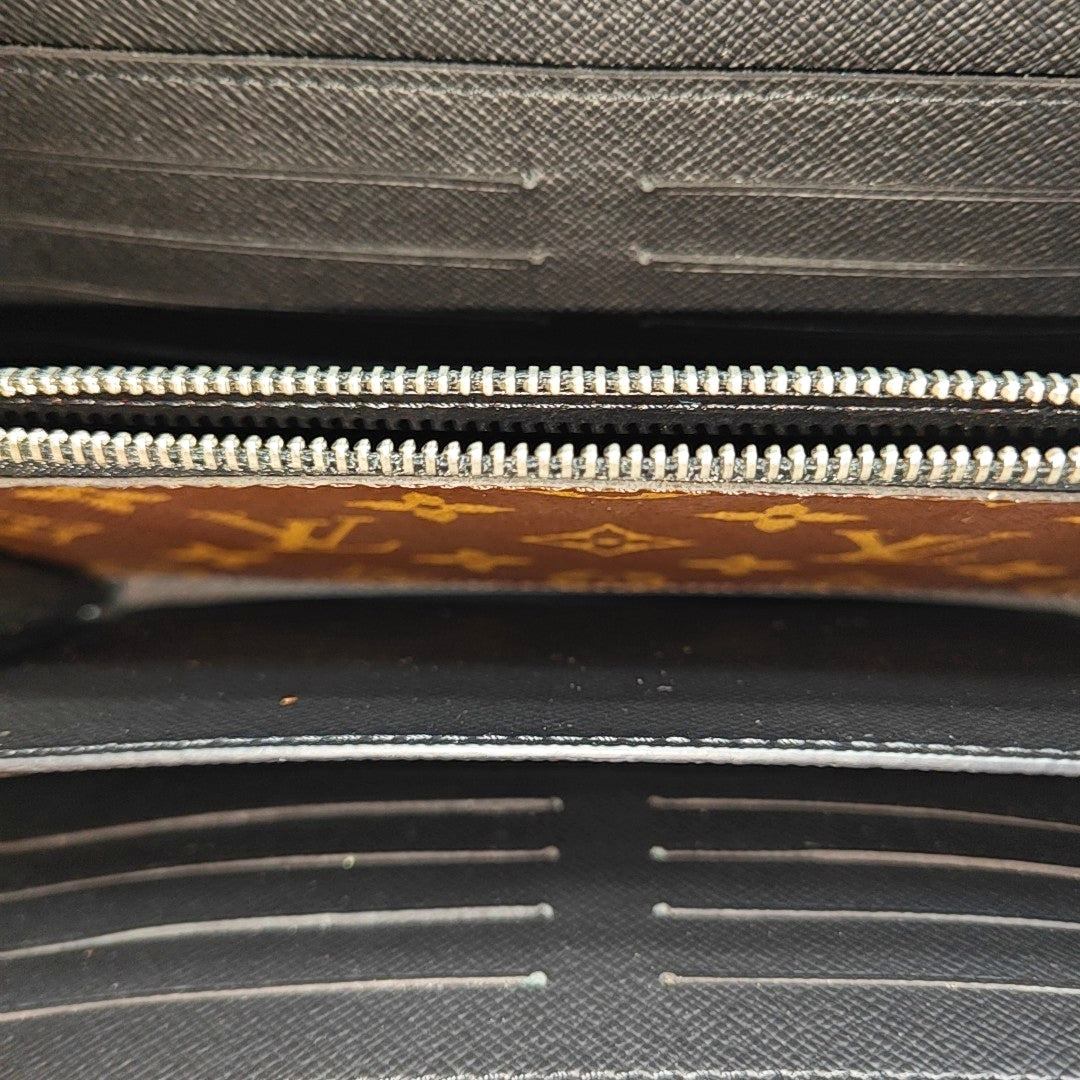 Monogram Coated Canvas Clutch Brown