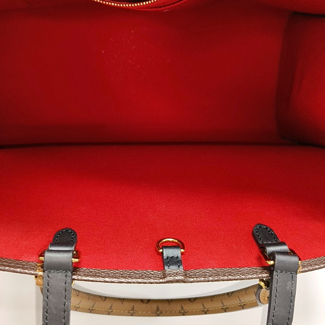 ONTHEGO GM Monogram Coated Canvas Brown