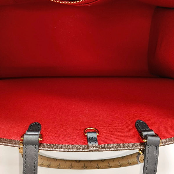ONTHEGO GM Monogram Coated Canvas Brown
