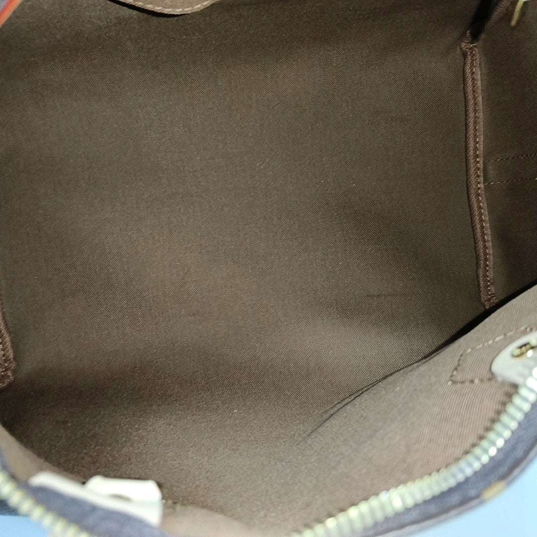 SPEEDY 30 Monogram Coated Canvas Brown