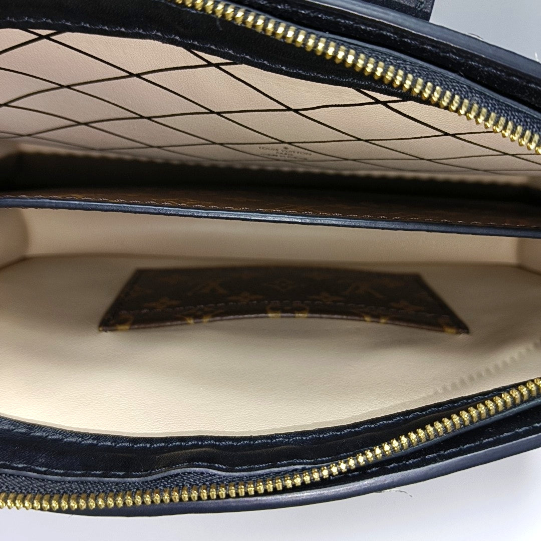 TRUNK Monogram Coated Canvas Brown
