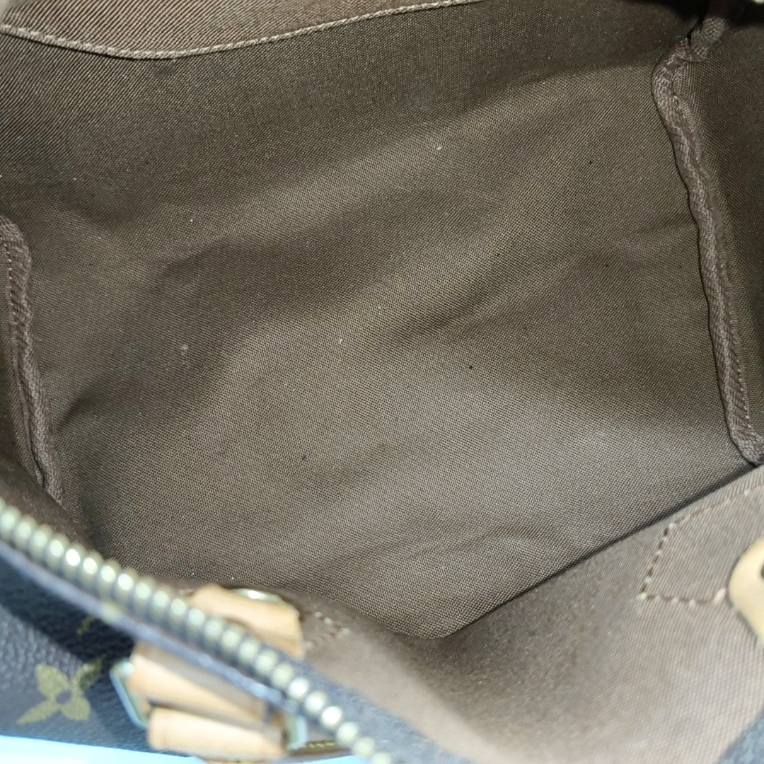SPEEDY 25 Monogram Coated Canvas Brown