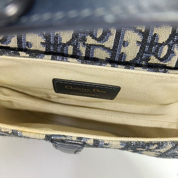 Authenticated pre-owned  Saddle Mini Monogram Canvas Blue - Top Handle Bag at Looply