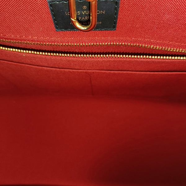 ONTHEGO MM Monogram Coated Canvas Brown