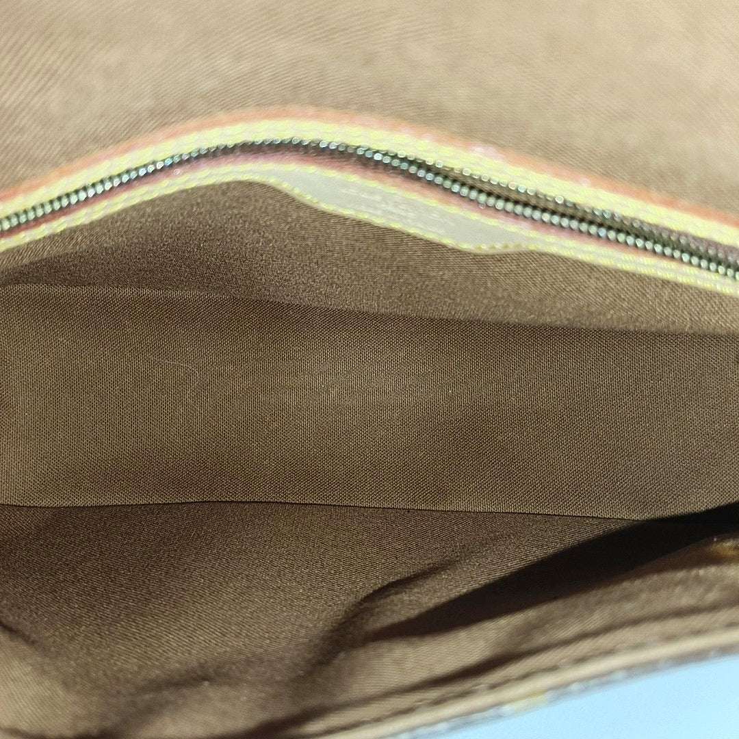 LOOPING PM Monogram Coated Canvas Brown