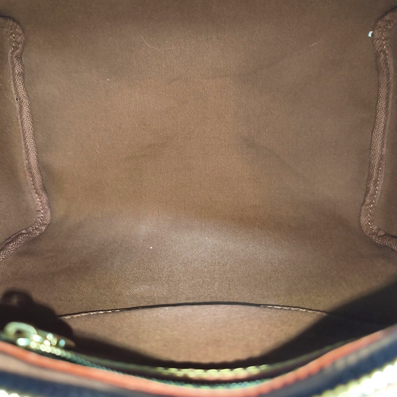 SPEEDY 25 Monogram Coated Canvas Brown