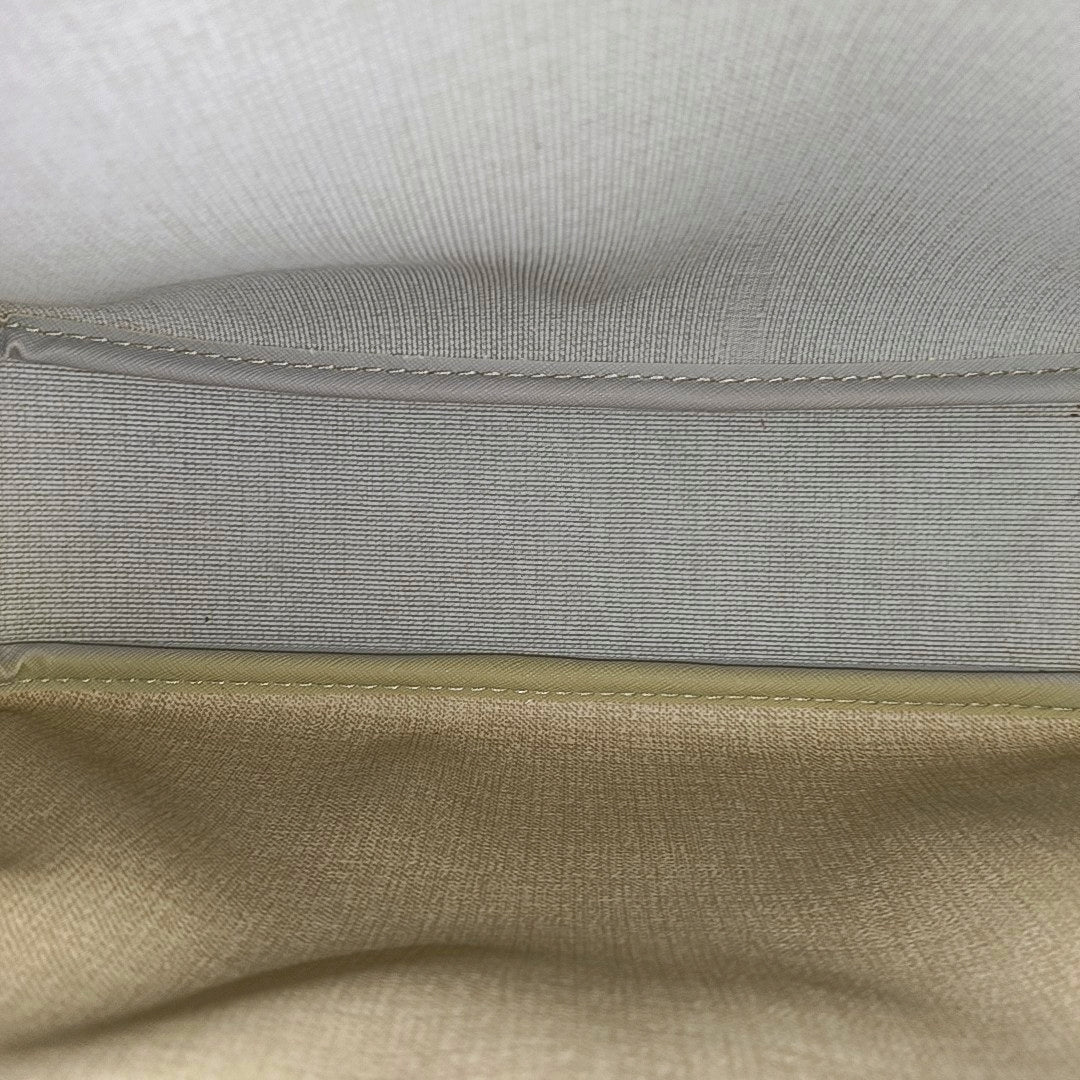 REPORTER PM Monogram Coated Canvas Brown
