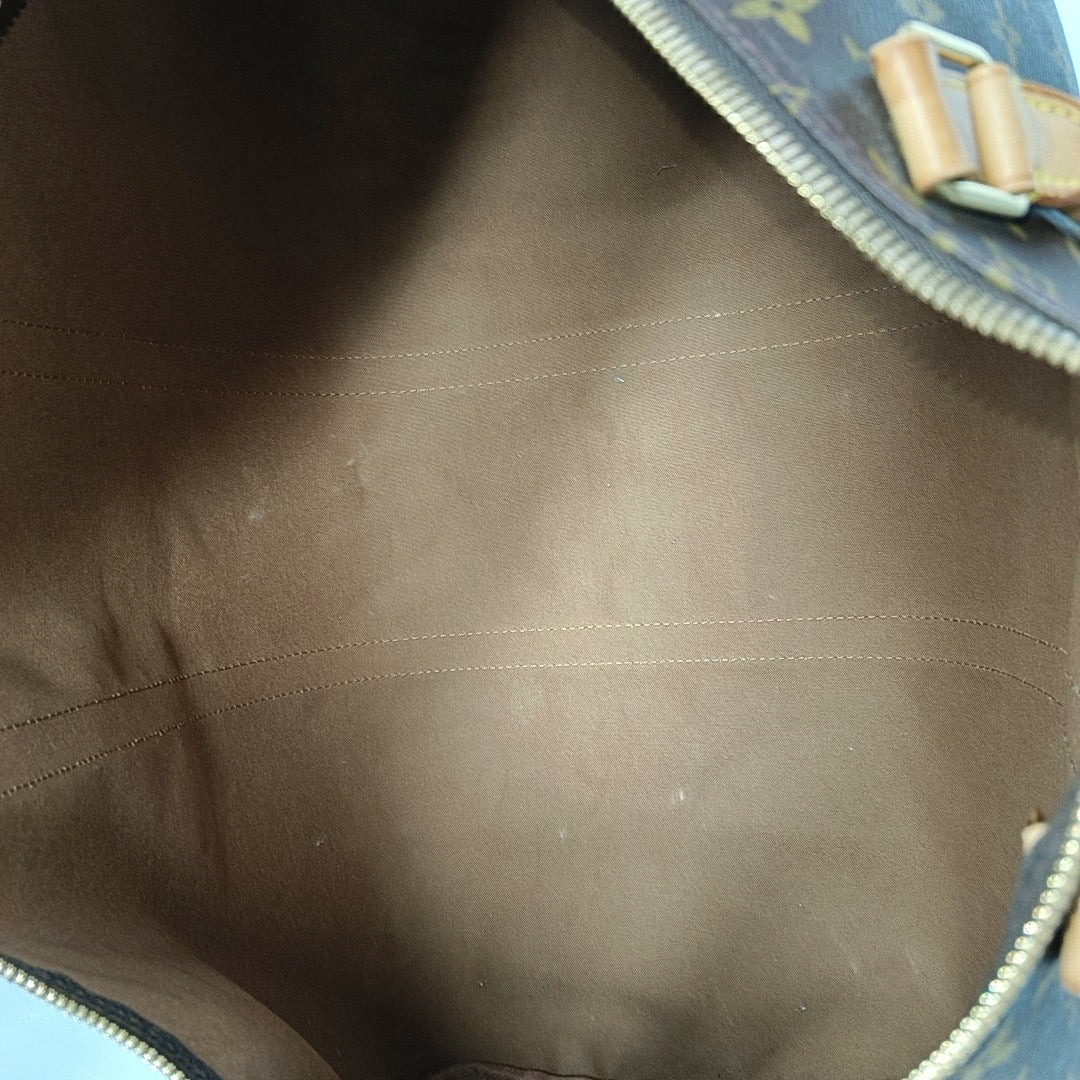 KEEPALL 60 Monogram Coated Canvas Brown
