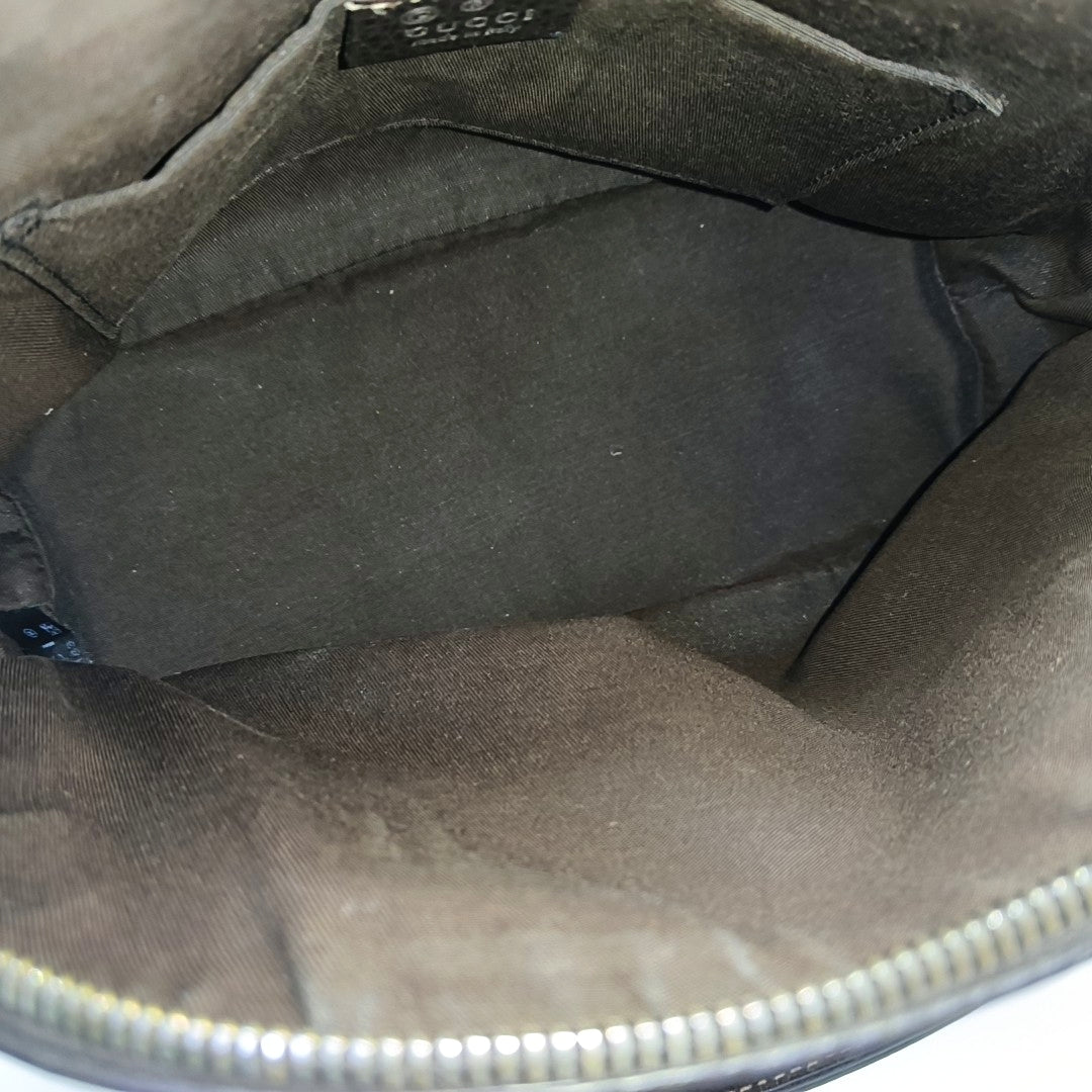 Dome Monogram Coated Canvas Brown