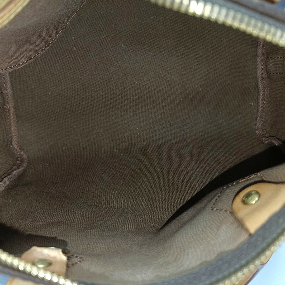SPEEDY 25 Monogram Coated Canvas Brown