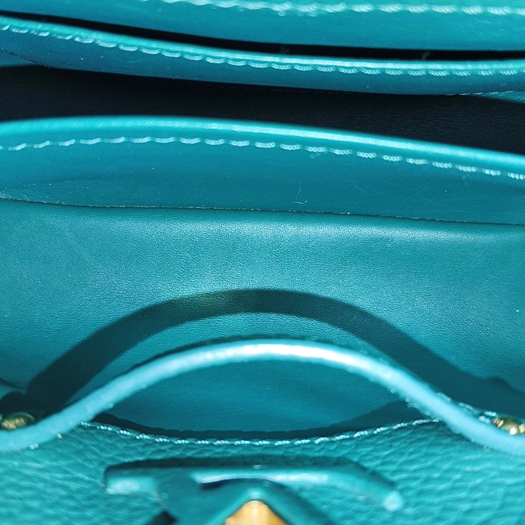Authenticated pre-owned  CAPUCINES Mini Calfskin Green - Shoulder Bag at Looply