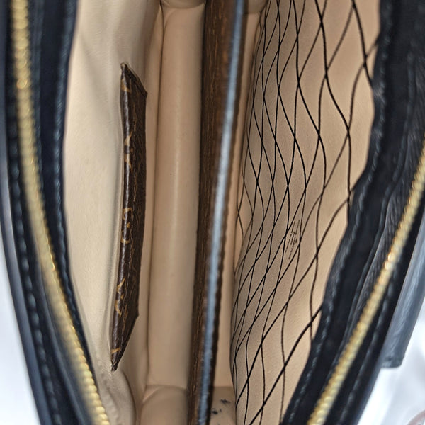 TRUNK Monogram Coated Canvas Brown