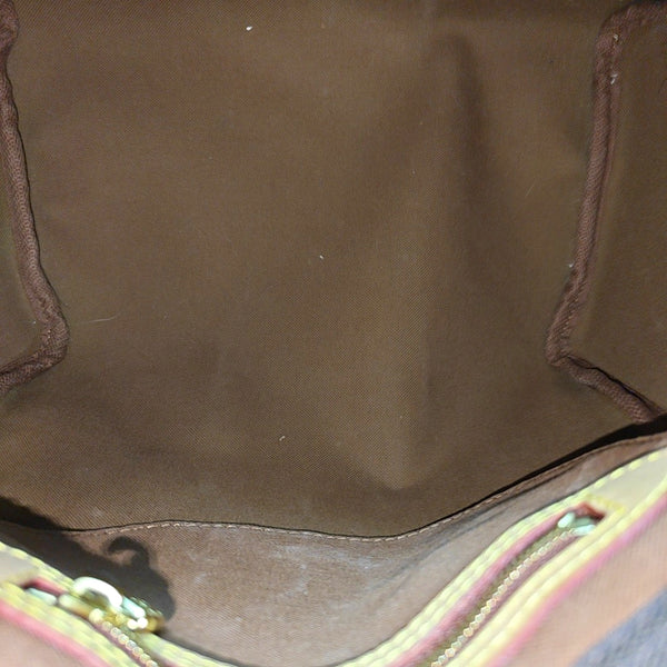 SPEEDY 25 Monogram Coated Canvas Brown