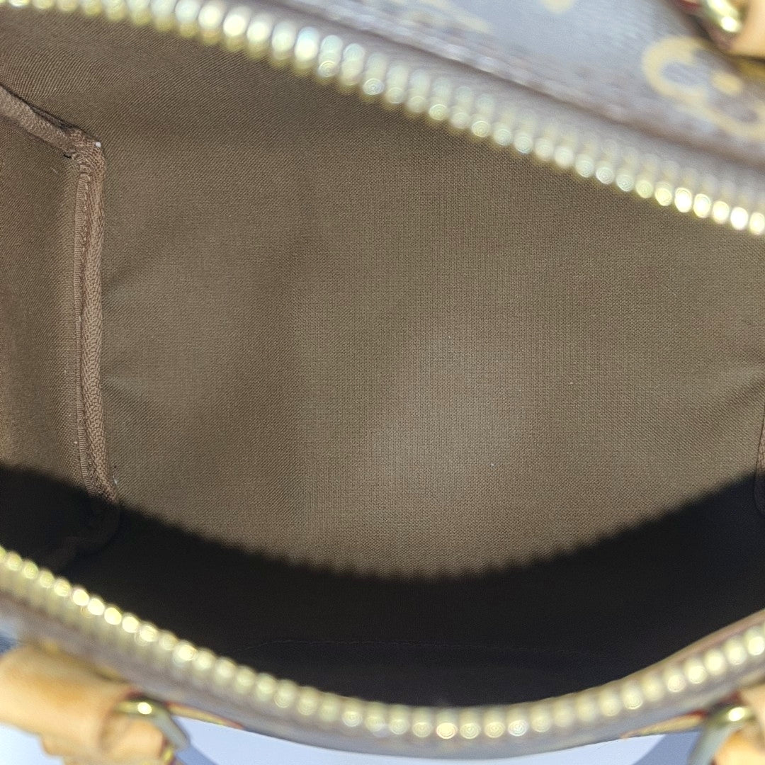 SPEEDY 25 Monogram Coated Canvas Brown