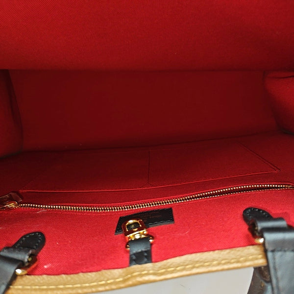 ONTHEGO GM Monogram Coated Canvas Brown