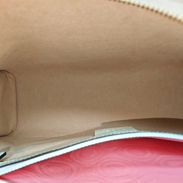 Monogram Coated Canvas Clutch Brown