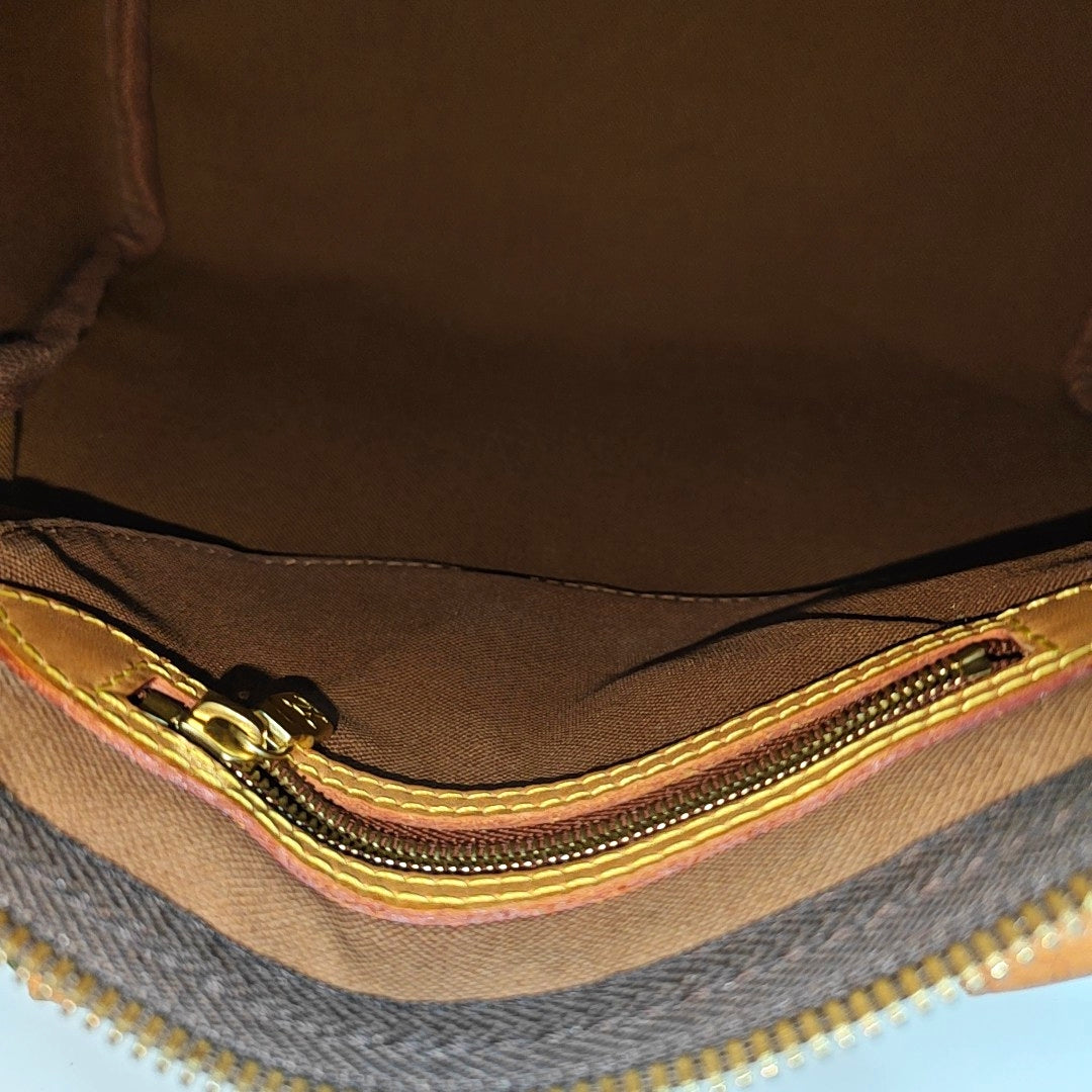 SPEEDY 25 Monogram Coated Canvas Brown