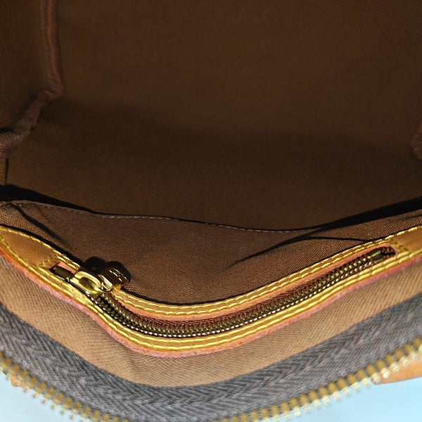SPEEDY 25 Monogram Coated Canvas Brown