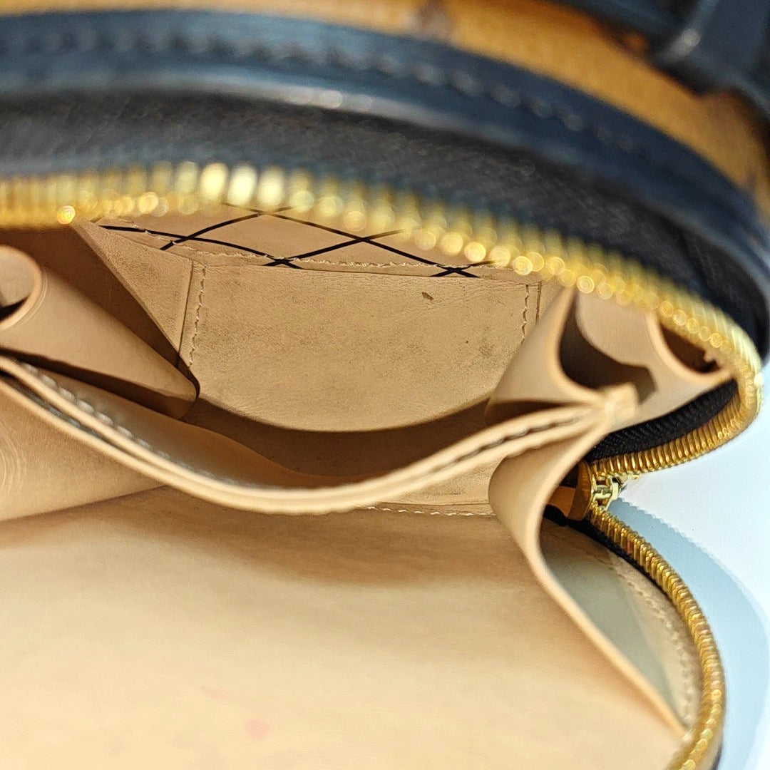 BOITE CHAPEAU Mini Monogram Coated Canvas Brown