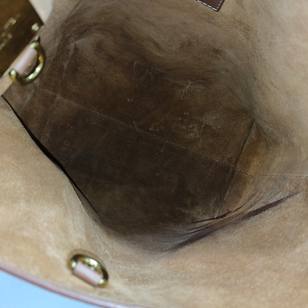 LOW KEY HOBO PM Monogram Calfskin Brown