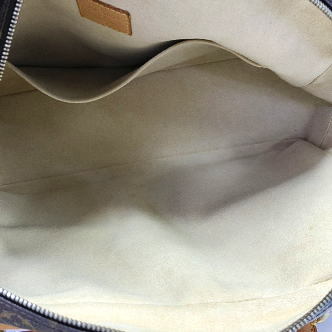MANHATTAN GM Monogram Coated Canvas Brown
