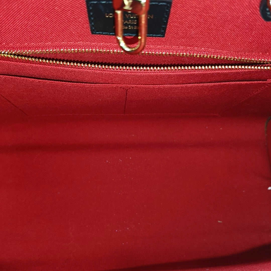 Authenticated pre-owned  ONTHEGO MM Monogram Coated Canvas Brown - Tote Bag at Looply