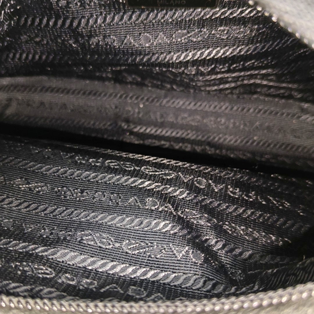 Authenticated pre-owned  Re-Edition2000 Mini Nylon Black - Top Handle Bag at Looply