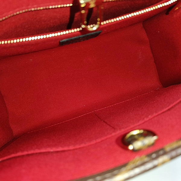 ONTHEGO PM Monogram Coated Canvas Brown