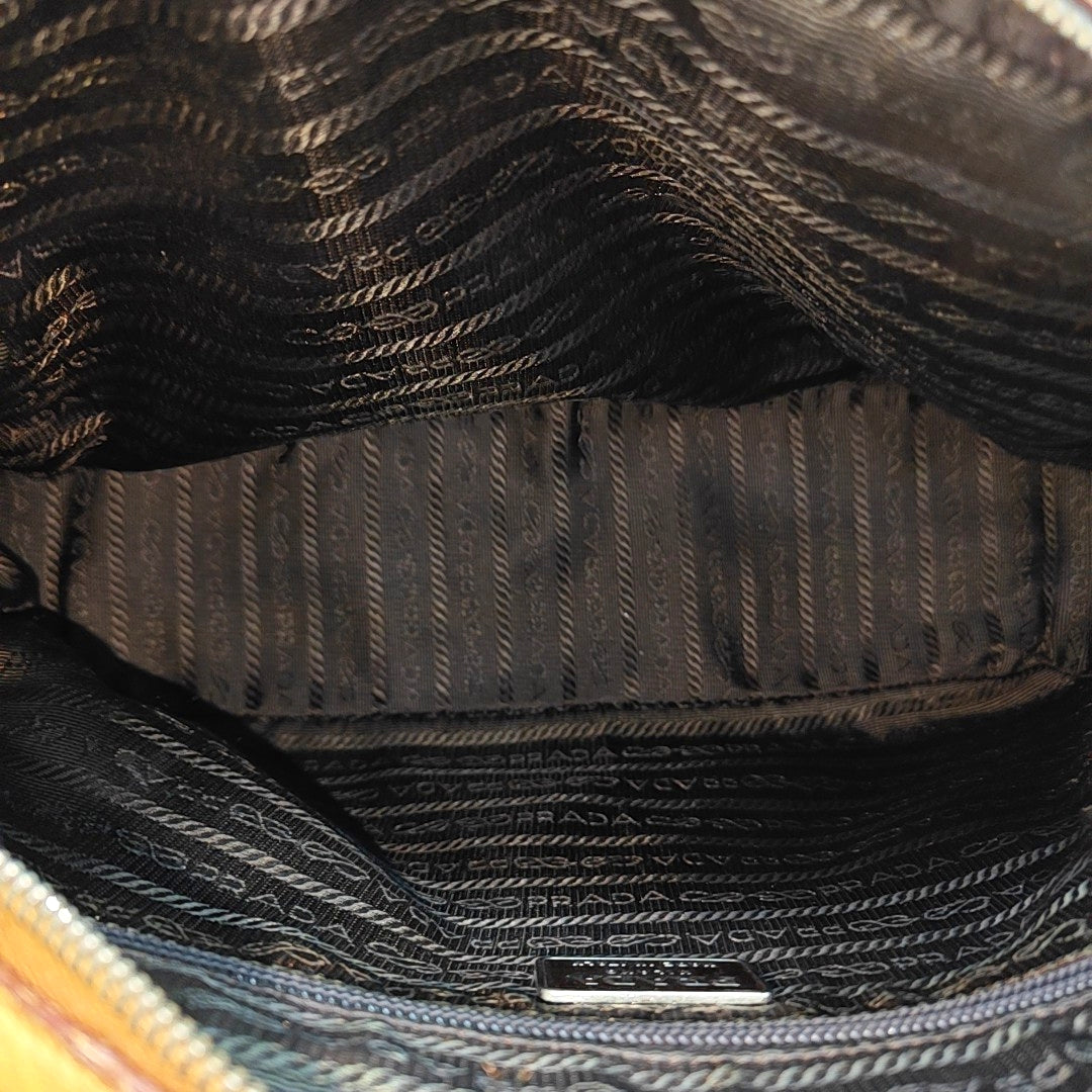 Bolso de mano de avestruz amarillo