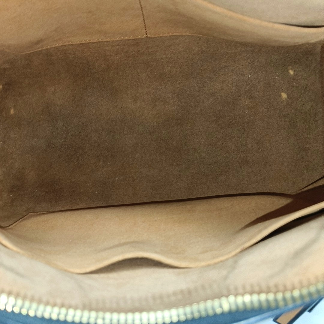 TUILERIES Monogram Coated Canvas Brown